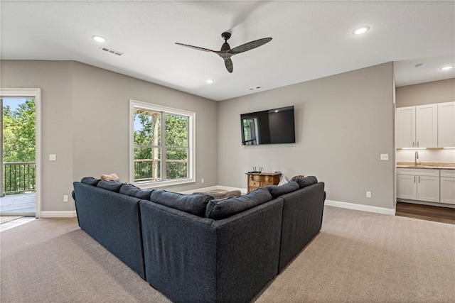8 Mckenzie Way, Bella Vista, AR 72715 - carpeted living area featuring ceiling fan and recessed lighting