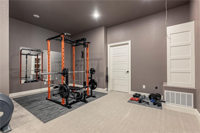 8 Mckenzie Way, Bella Vista, AR 72715 - exercise room with carpet flooring, recessed lighting, and a textured wall