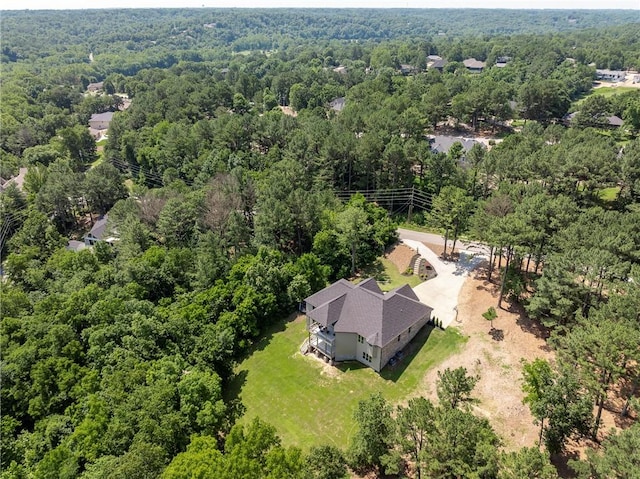 8 Mckenzie Way, Bella Vista, AR 72715 - aerial view of property and surrounding area featuring a heavily wooded area