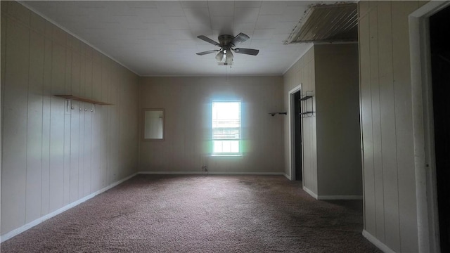 4436 State Highway 288, Subiaco, AR 72865 - carpeted spare room with a ceiling fan and wood walls