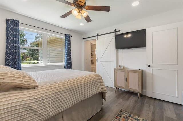 3902 Layton Dr, Harrison, AR 72601 - bedroom with a barn door, wood finished floors, recessed lighting, a ceiling fan, and connected bathroom