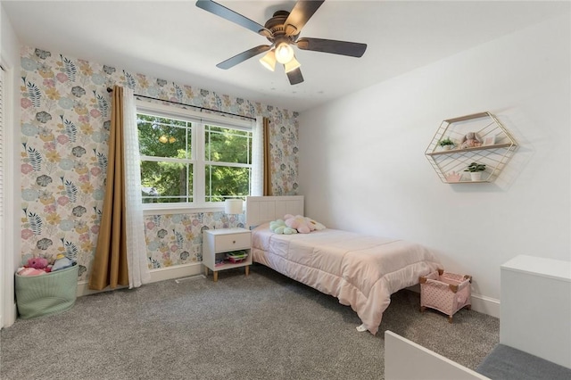 3902 Layton Dr, Harrison, AR 72601 - carpeted bedroom with baseboards and a ceiling fan