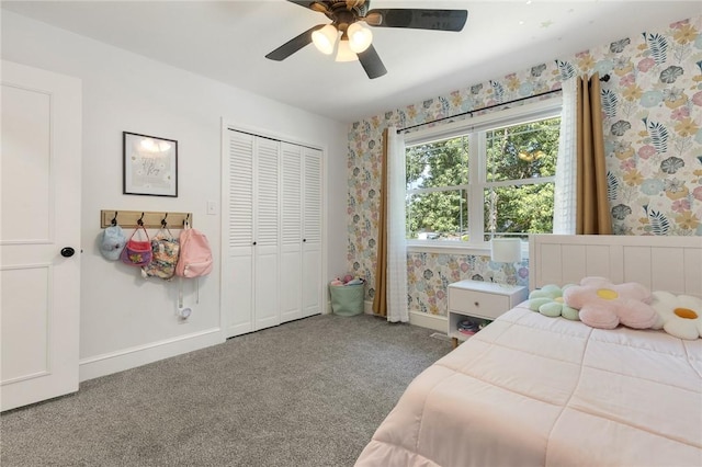 3902 Layton Dr, Harrison, AR 72601 - bedroom with carpet floors, wallpapered walls, a ceiling fan, and a closet