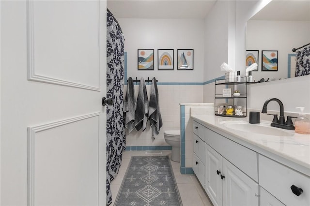 3902 Layton Dr, Harrison, AR 72601 - full bath with tile patterned flooring, vanity, wainscoting, tile walls, and a shower with curtain