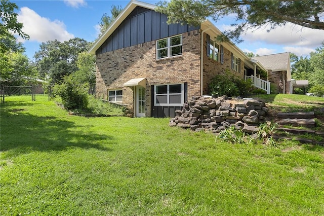 3902 Layton Dr, Harrison, AR 72601 - view of side of property with board and batten siding and brick siding