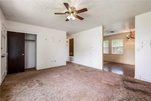 2000 W Wood St, Rogers, AR 72756 - unfurnished bedroom with carpet, a textured ceiling, a chandelier, a closet, and ceiling fan
