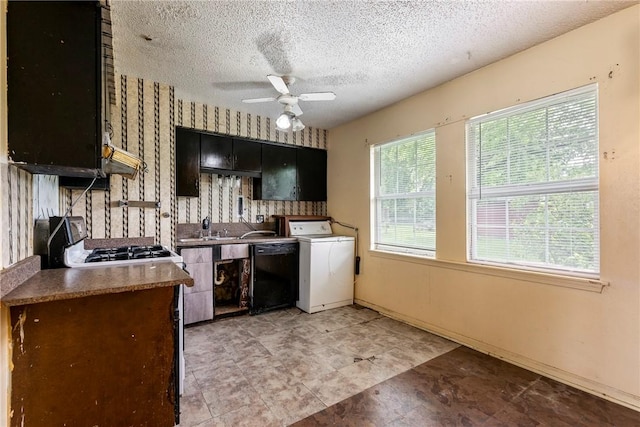 2000 W Wood St, Rogers, AR 72756 - kitchen with washer / dryer, dishwasher, a textured ceiling, a ceiling fan, and dark cabinets