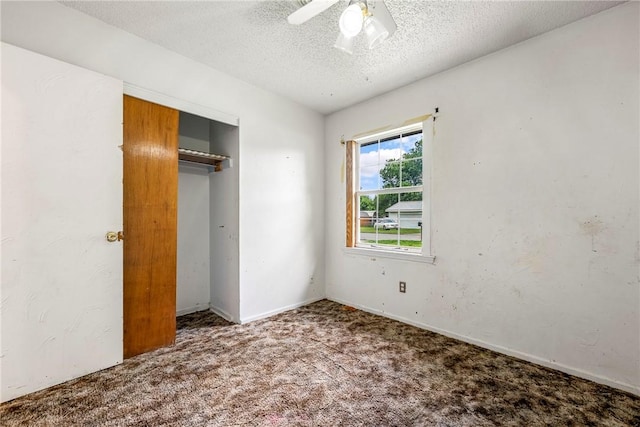 2000 W Wood St, Rogers, AR 72756 - unfurnished bedroom with carpet floors, a textured ceiling, a closet, and ceiling fan