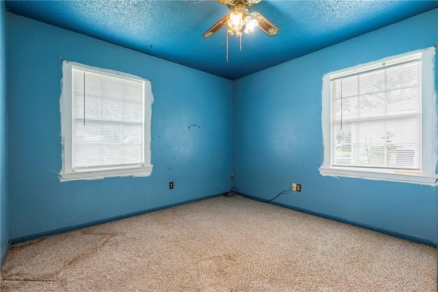 2000 W Wood St, Rogers, AR 72756 - carpeted spare room featuring a ceiling fan and a textured ceiling