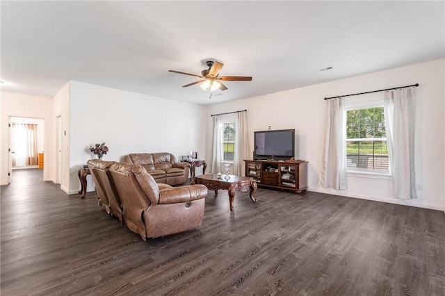 1209 W Olive St, Rogers, AR 72756 - living room featuring dark wood-style flooring, plenty of natural light, and a ceiling fan