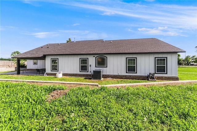 1209 W Olive St, Rogers, AR 72756 - rear view of house with a patio area, roof with shingles, and board and batten siding
