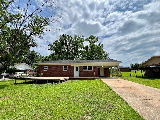 3501 Pleasant, Ozark, AR 72949 - ranch-style home with concrete driveway, brick siding, an attached carport, and a front yard
