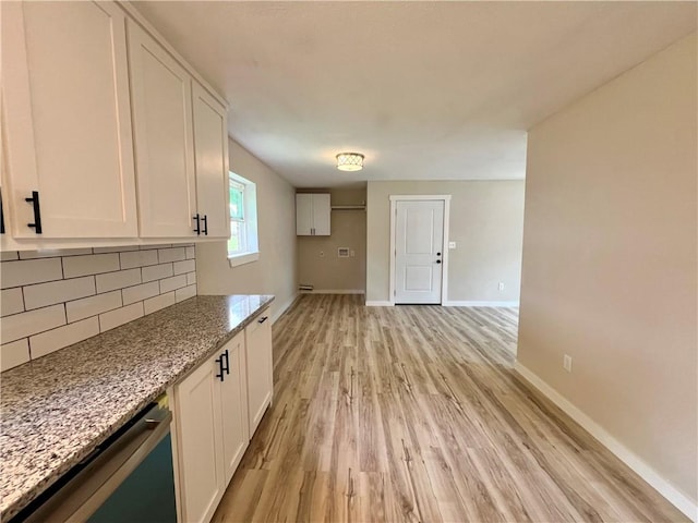 3501 Pleasant, Ozark, AR 72949 - kitchen with dishwasher, decorative backsplash, light wood-style floors, and white cabinetry
