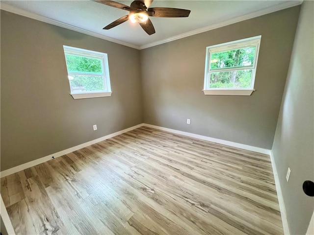 3501 Pleasant, Ozark, AR 72949 - empty room with crown molding, ceiling fan, and wood finished floors