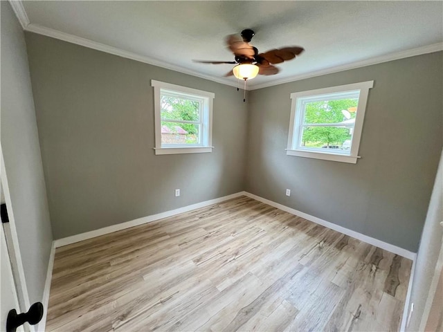 3501 Pleasant, Ozark, AR 72949 - empty room featuring healthy amount of natural light, ornamental molding, light wood-type flooring, and a ceiling fan