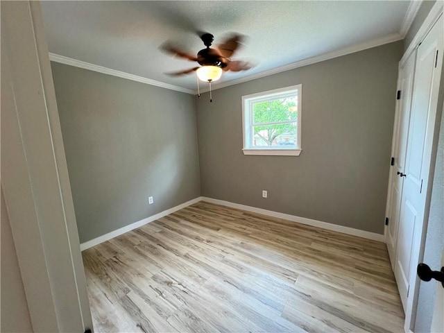 3501 Pleasant, Ozark, AR 72949 - empty room with crown molding, light wood finished floors, and a ceiling fan
