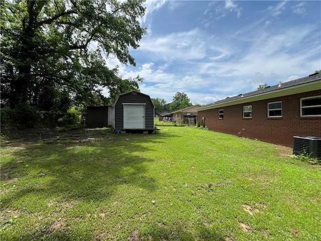 3501 Pleasant, Ozark, AR 72949 - view of grassy yard with a storage unit