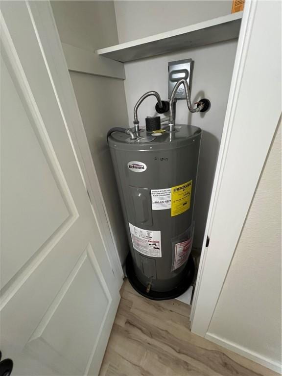 3501 Pleasant, Ozark, AR 72949 - utility room with water heater