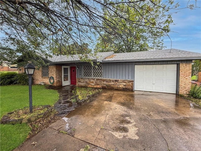 1906 S W End St, Springdale, AR 72764 - single story home featuring a garage, a front yard, concrete driveway, and board and batten siding