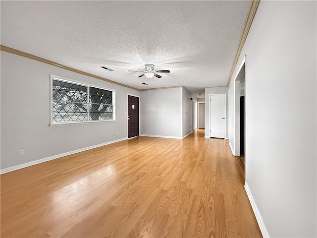 1906 S W End St, Springdale, AR 72764 - empty room with a ceiling fan, a textured ceiling, crown molding, and light wood-style flooring