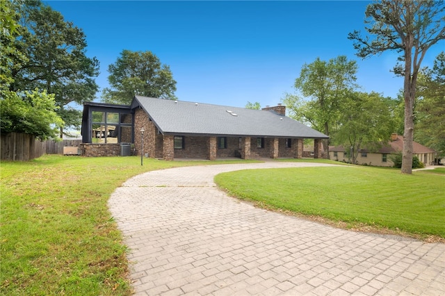 213 Suttle Dr, Springdale, AR 72764 - view of front of home with curved driveway and a chimney