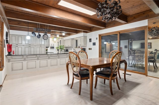213 Suttle Dr, Springdale, AR 72764 - dining area featuring a chandelier, a wood ceiling with exposed beams, and light wood finished floors