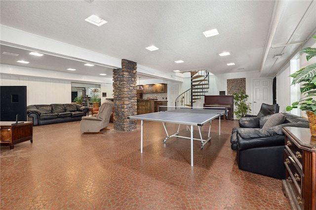 213 Suttle Dr, Springdale, AR 72764 - rec room featuring ornate columns and a textured ceiling