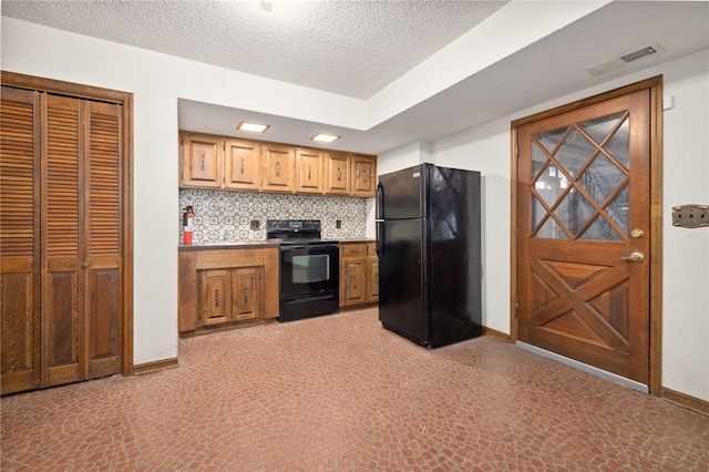 213 Suttle Dr, Springdale, AR 72764 - kitchen featuring black appliances, a textured ceiling, brown cabinets, tasteful backsplash, and light floors