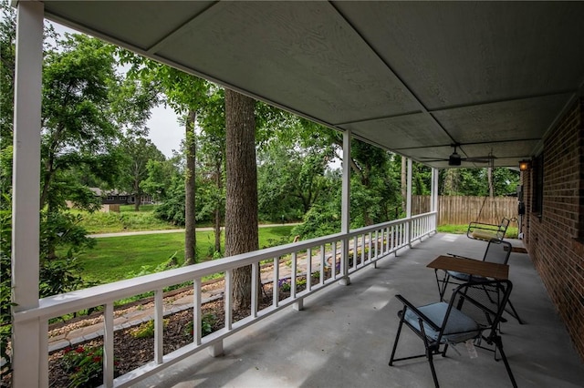 707 Turtle Creek Dr, Rogers, AR 72756 - covered porch with view of scattered trees