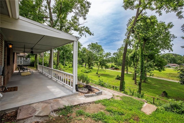 707 Turtle Creek Dr, Rogers, AR 72756 - view of grassy yard with a porch