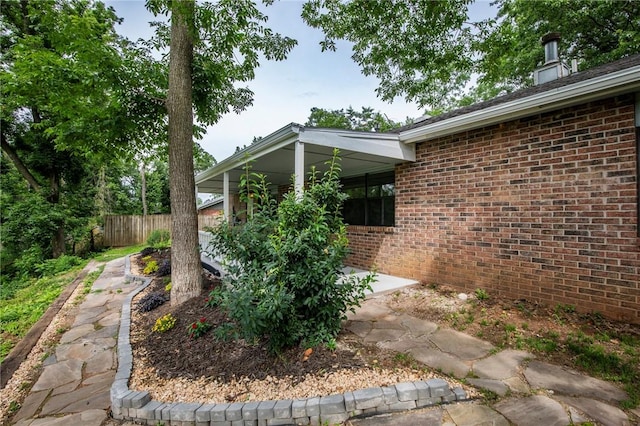 707 Turtle Creek Dr, Rogers, AR 72756 - view of property exterior with brick siding