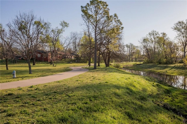 707 Turtle Creek Dr, Rogers, AR 72756 - view of home's community with a lawn