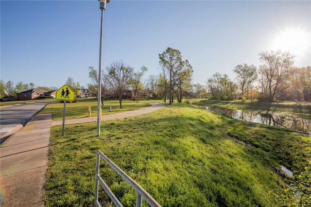 707 Turtle Creek Dr, Rogers, AR 72756 - view of grassy yard featuring a water view