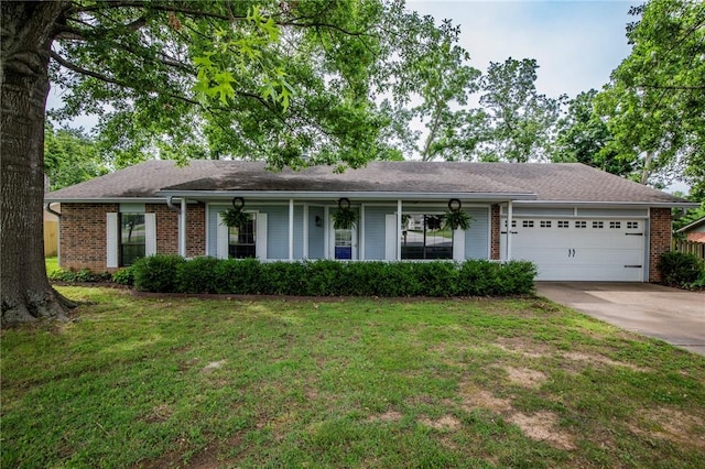 707 Turtle Creek Dr, Rogers, AR 72756 - single story home featuring an attached garage, driveway, a front lawn, and brick siding