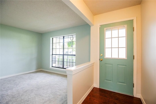 707 Turtle Creek Dr, Rogers, AR 72756 - entryway with baseboards and a textured ceiling