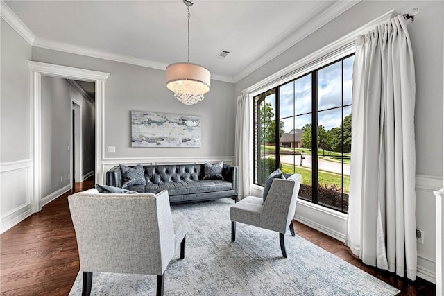 601 Chattin Cir, Bentonville, AR 72713 - living area featuring ornamental molding, dark wood-style flooring, and wainscoting