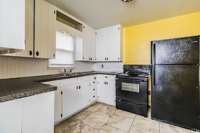 845 S Wright St, Siloam Springs, AR 72761 - kitchen featuring black appliances, dark countertops, and white cabinets