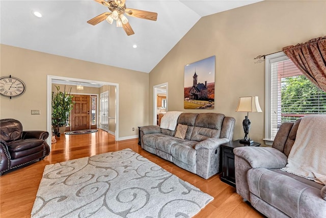 8270 Titleist Cir, Rogers, AR 72756 - living area with a ceiling fan, light wood finished floors, high vaulted ceiling, and recessed lighting