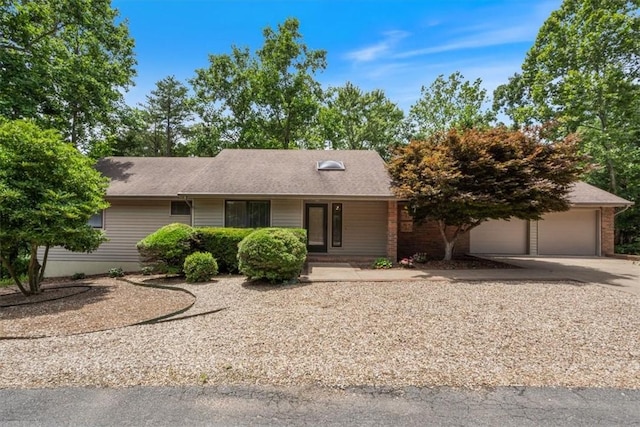 20 Kirkcudbright, Bella Vista, AR 72715 - ranch-style house with driveway, an attached garage, and brick siding