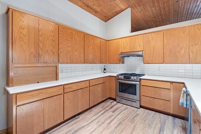 20 Kirkcudbright, Bella Vista, AR 72715 - kitchen with gas stove, under cabinet range hood, backsplash, light countertops, and wood ceiling