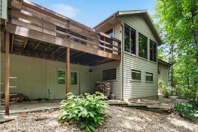 20 Kirkcudbright, Bella Vista, AR 72715 - back of property with a deck