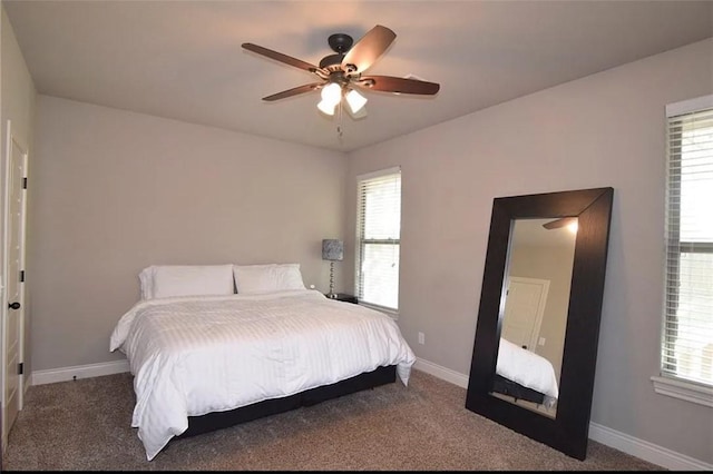 1730 Helen Ln, Bentonville, AR 72713 - carpeted bedroom with baseboards and a ceiling fan