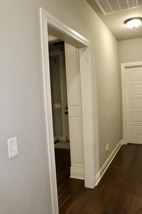 1730 Helen Ln, Bentonville, AR 72713 - hallway featuring dark wood-style flooring and baseboards