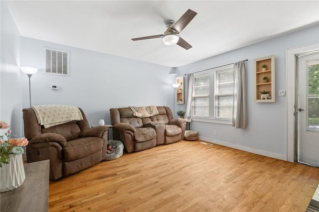 224 N Allen St, Harrison, AR 72601 - living area featuring wood finished floors and ceiling fan