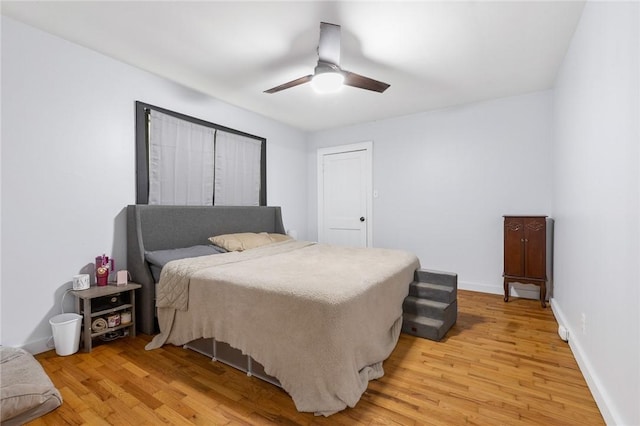 224 N Allen St, Harrison, AR 72601 - bedroom with light wood-style flooring and ceiling fan