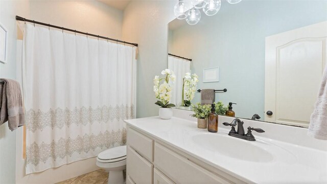 4903 S Inglewood Rd, Rogers, AR 72758 - full bath with vanity, tile patterned floors, and shower / bath combo