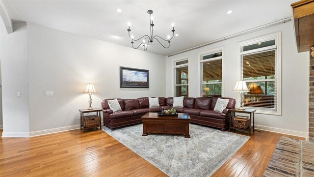 4903 S Inglewood Rd, Rogers, AR 72758 - living room featuring light wood-type flooring, a chandelier, and recessed lighting