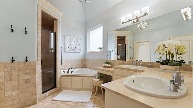 4903 S Inglewood Rd, Rogers, AR 72758 - bathroom with a stall shower, a bath, double vanity, tile patterned floors, and vaulted ceiling
