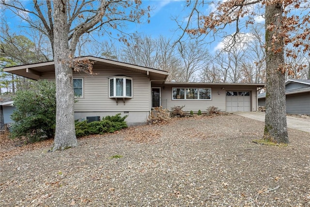 1 Syston Ln, Bella Vista, AR 72714 - view of front facade with driveway, a garage, and crawl space