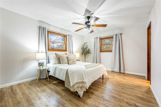 1 Syston Ln, Bella Vista, AR 72714 - bedroom with light wood-style floors and ceiling fan